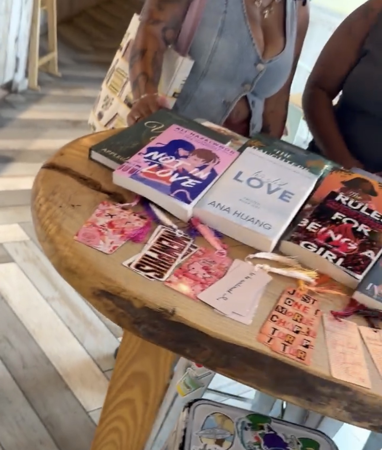 Books and handmade bookmarks displayed at a Books and Babes book swap